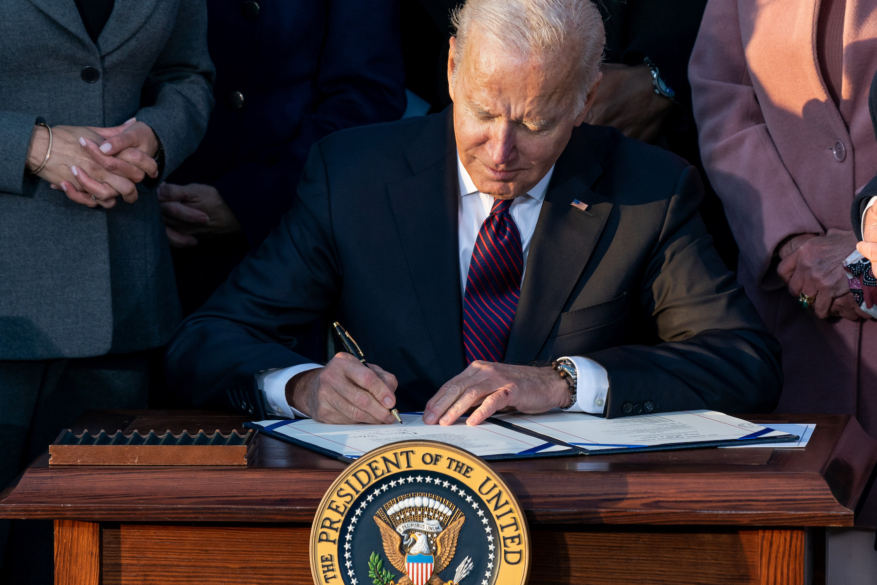 President Joe Biden signing the Infrastructure Investment and Jobs Act, Monday, November 15, 2021, on the South Lawn of the White House.