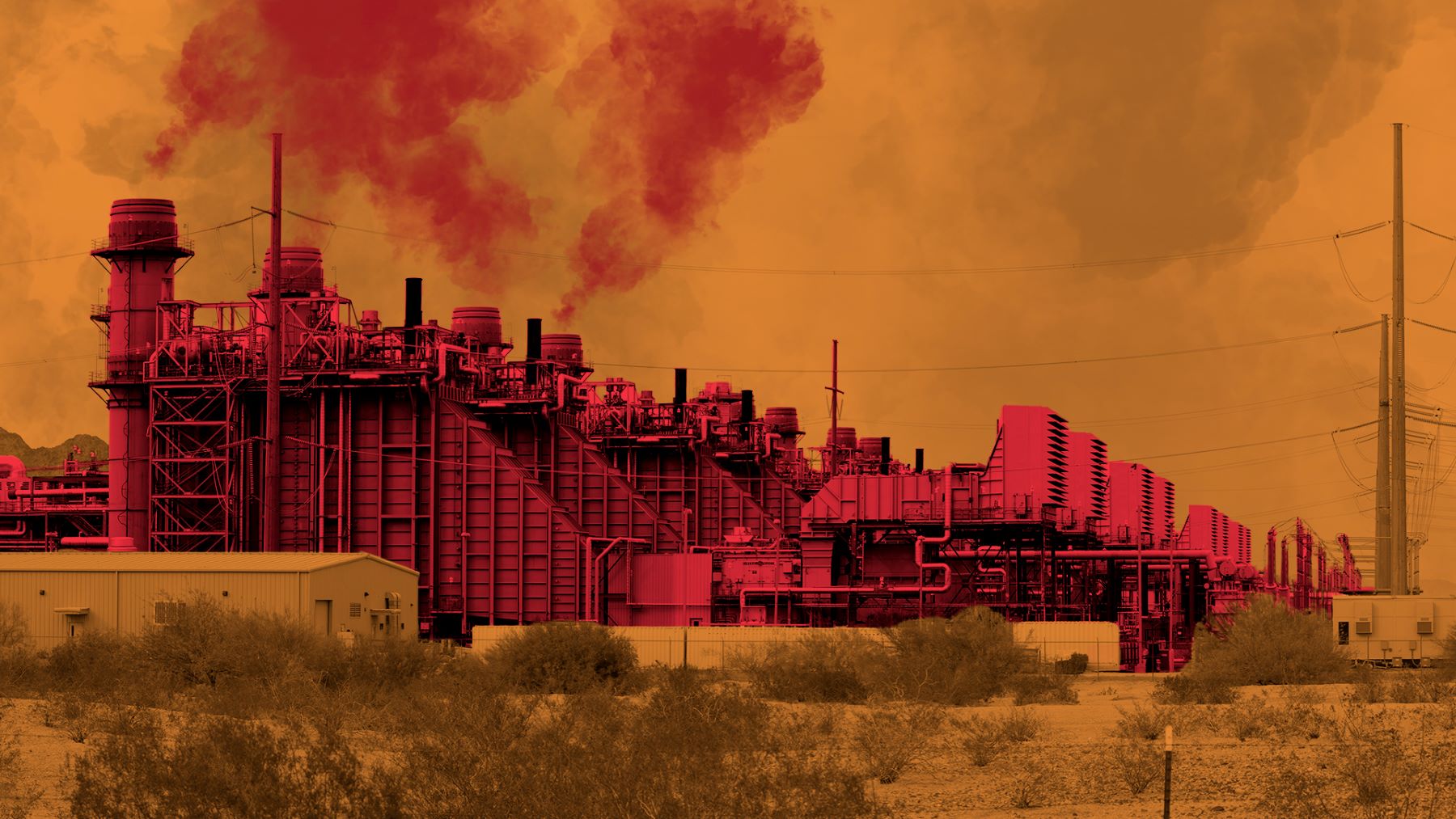 A gas power plant in the Arizona desert. The photo has a red and orange filter.