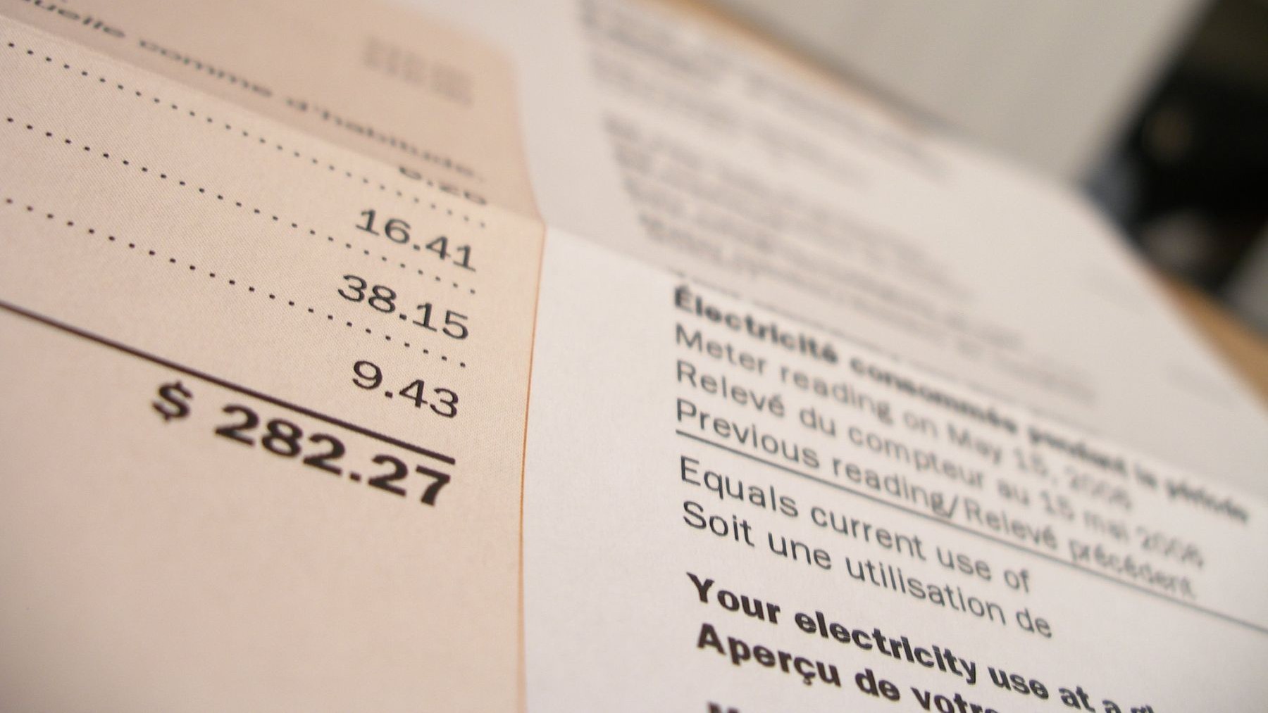 Up close shot of an electricity bill totaling $200 dollars