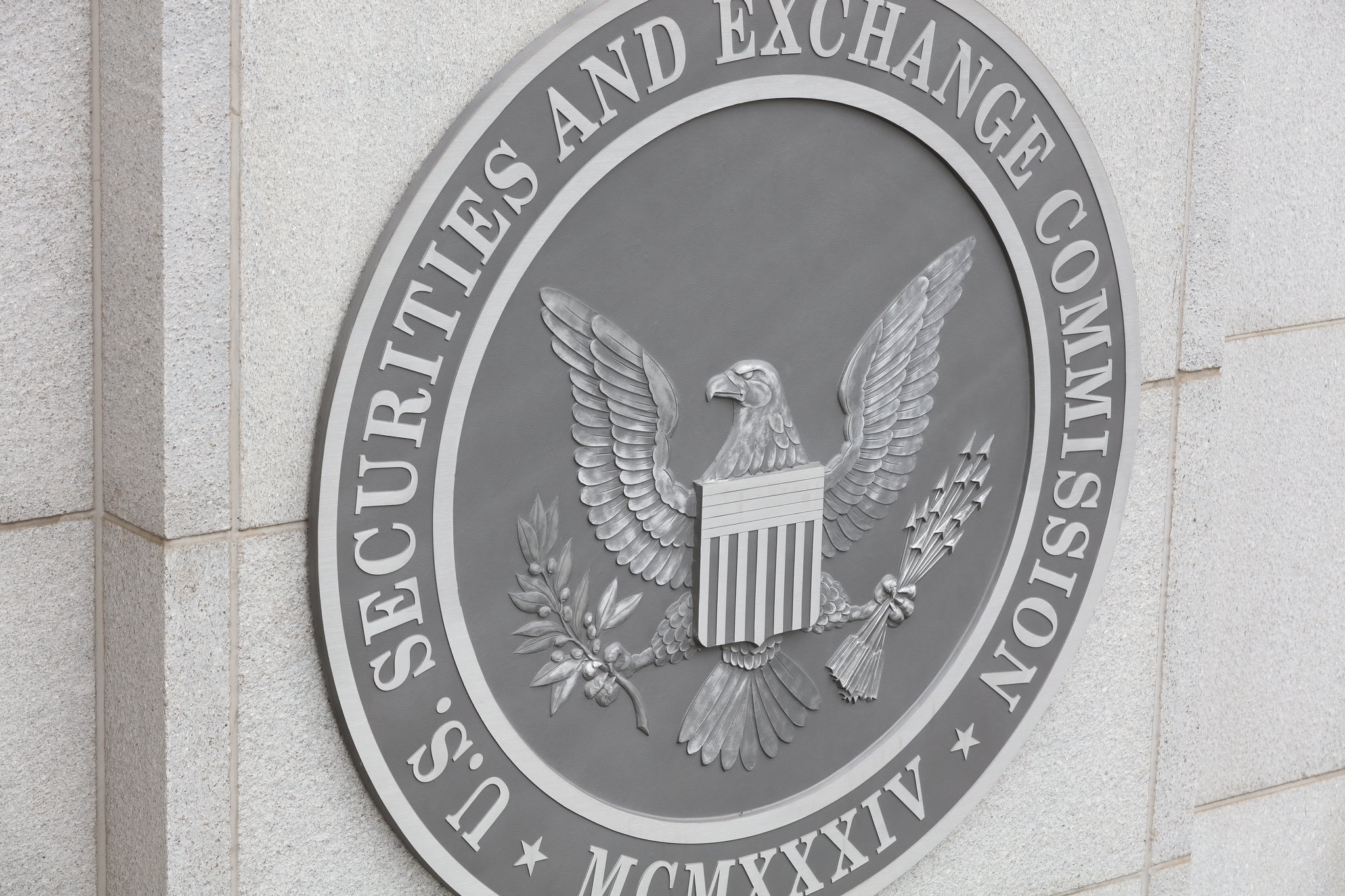The seal on the SEC building headquarters 