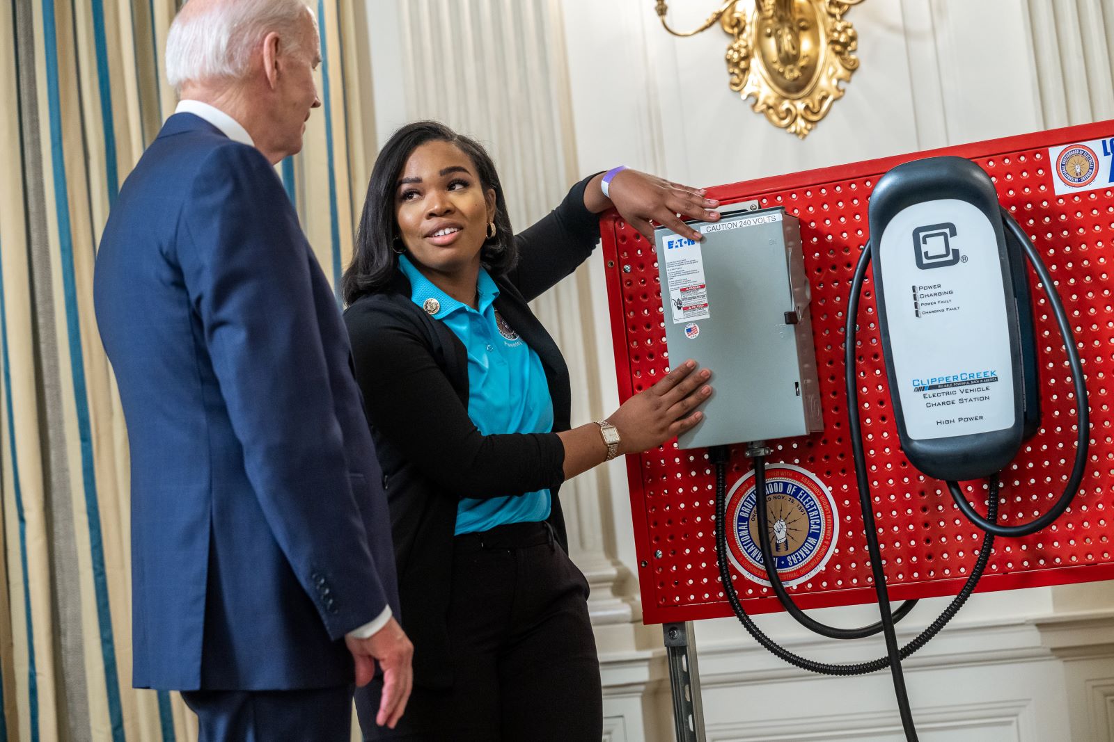 President Biden being showed an EV charging station at the White House