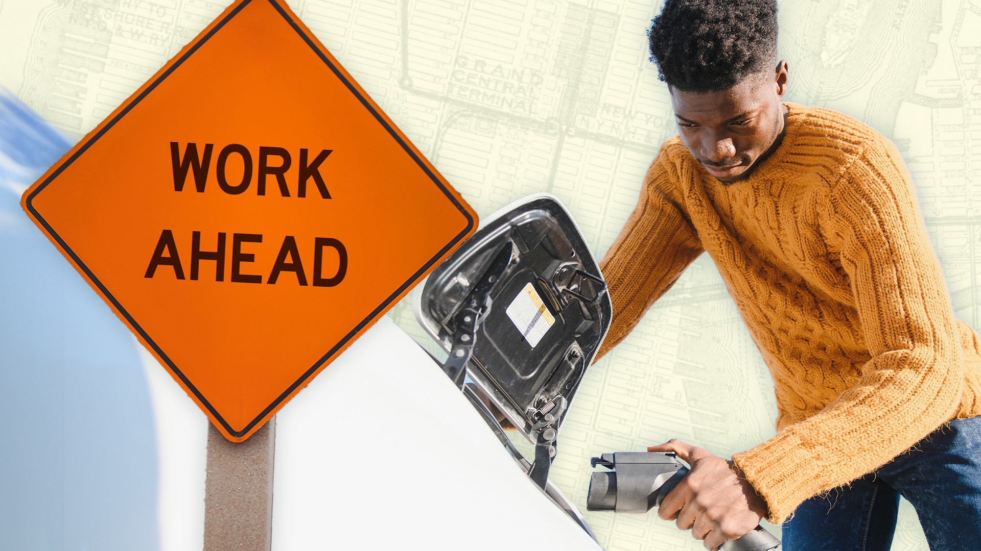 Man plugging in an electric charger into a white car. A sign in front of him reads 