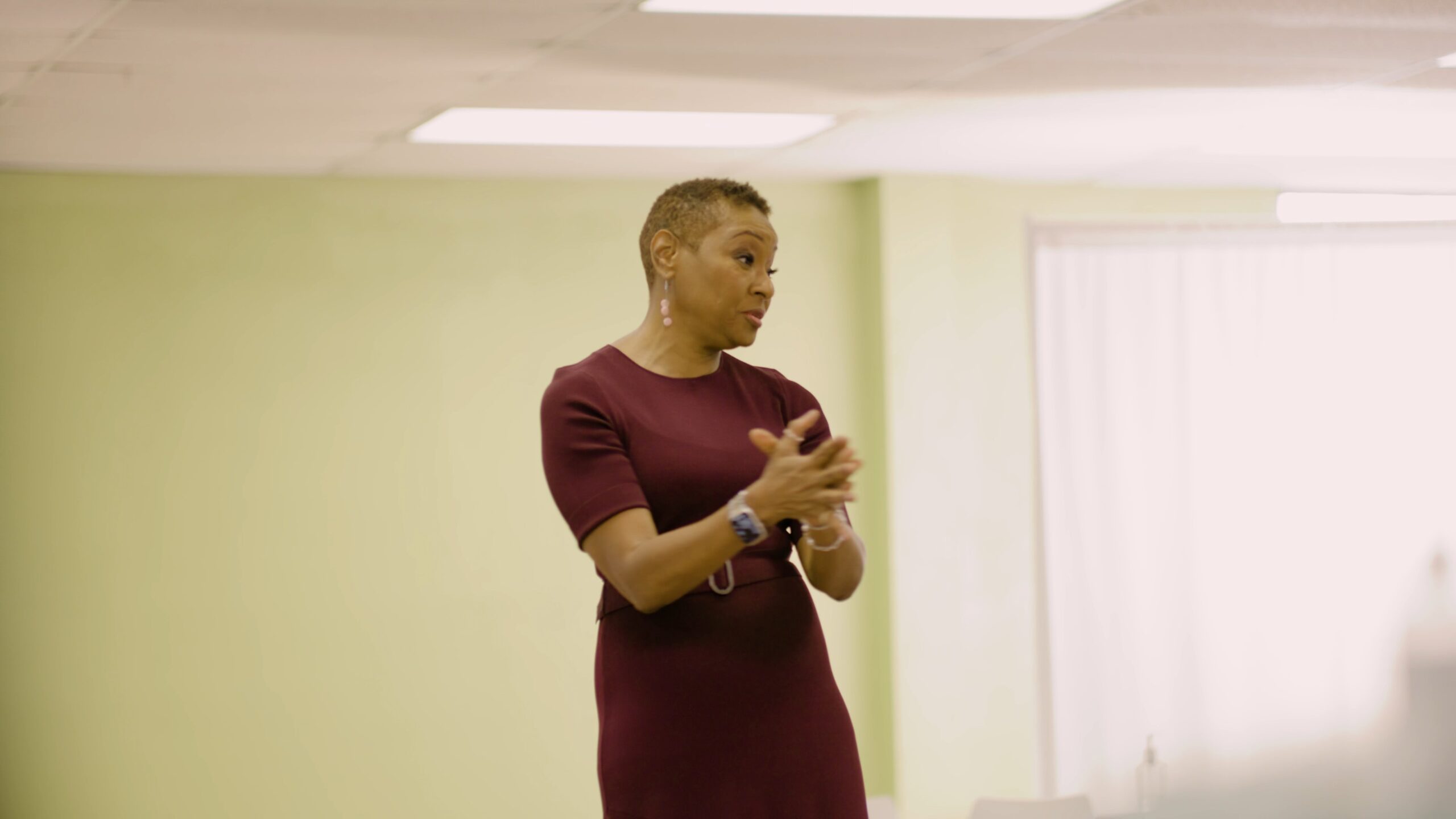 Carla Walker-Miller speaking in a conference room