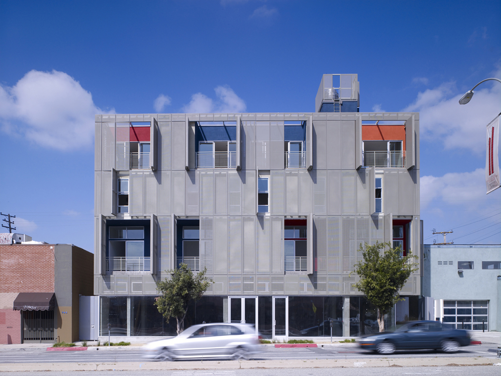 Tall grey modern energy efficient housing in a city