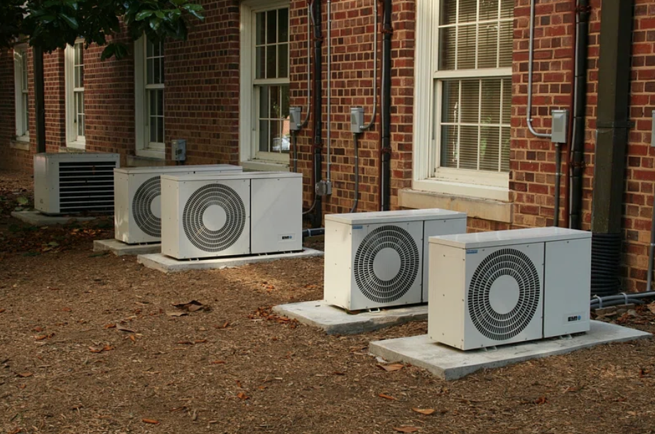 Heatpumps outside of a brick building